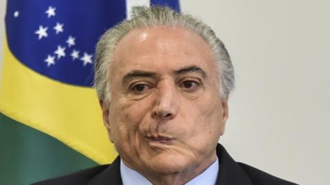 President of Brazil Michel Temer attends technical cooperation agreement signing ceremony with the Court Superior Electoral (TSE) at Planalto Palace in Brasilia, Brazil on October 11, 2016. (Ricardo Botelho/Brazil Photo Press/LatinContent/Getty Images)