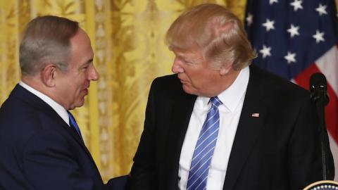 U.S. President Donald Trump (R) and Israel Prime Minister Benjamin Netanyahu (L) shake hands during a joint news conference at the White House February 15, 2017 in Washington, DC. (Win McNamee/Getty Images)