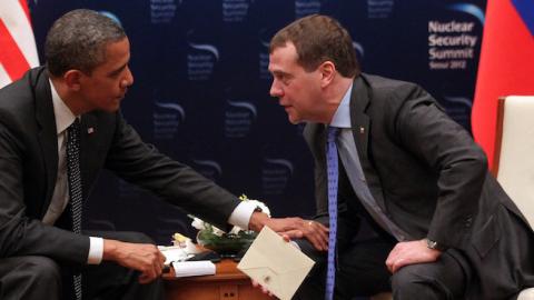 (L-R) U.S. President Barack Obama and Russian President Dmitry Medvedev talk during the 2012 Seoul Nuclear Security Summit at the Hankuk University of Foreign Studies on March 26, 2012 in Seoul, South Korea. (Sasha Mordovets/Getty Images)