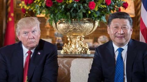 US President Donald Trump (L) sits with Chinese President Xi Jinping (R) during a bilateral meeting at the Mar-a-Lago estate in West Palm Beach, Florida, on April 6, 2017. (JIM WATSON/AFP/Getty Images)