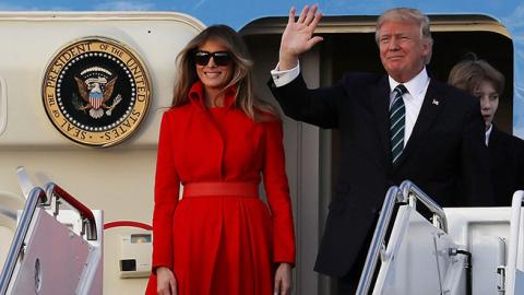 President Donald Trump, his wife Melania Trump and their son Barron Trump arrive together on Air Force One at the Palm Beach International Airport, March 17, 2017 (Joe Raedle/Getty Images)