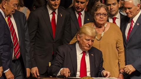 President Donald Trump signs policy changes on Cuba, Miami, Florida, June 16, 2017 (Raul E. Diego/Anadolu Agency/Getty Images)