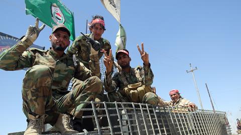 Members of the Iraqi Hashed al-Shaabi (Popular Mobilization) paramilitary forces southwest of Mosul, April 28, 2017 (AHMAD AL-RUBAYE/AFP/Getty Images)