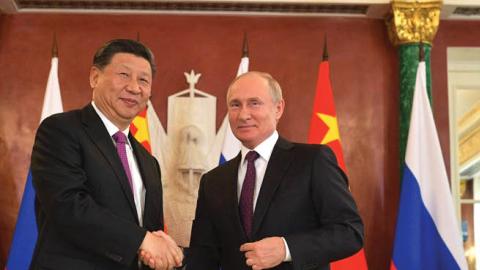Chinese Leader Xi Jinping meets Russian President Vladimir Putin in Moscow, Russia on June 05, 2019. (Photo by Kremlin Press Office/Anadolu Agency/Getty Images)