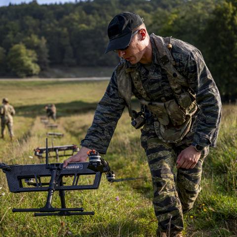 U.S. Army Staff Sgt. Shawn Bailey, a Small Unmanned Aerial System master trainer with the 1st Battalion of the 4th Infantry Regiment, sets up a TS-M800 II drone during Saber Junction 23 at the Joint Multinational Readiness Center near Hohenfels, Germany, Sept. 11, 2023. (DVIDS)