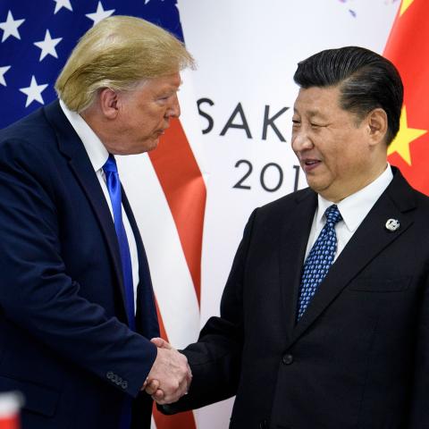 Xi Jinping shakes hands with Donald Trump at the G20 Summit in Osaka, Japan, on June 29, 2019. (Brendan Smialowski/AFP via Getty Images)