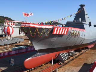 The destroyer JS Yubetsu is launched at the Mitsubishi Heavy Industries headquarters in Tamano, Japan, on November 14, 2023, 