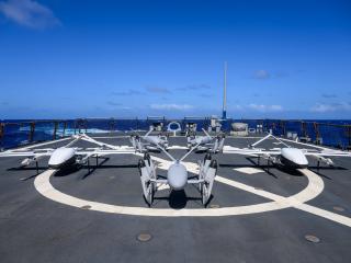 Uncrewed aerial systems from Skyways and PteroDynamics sit on the flight deck of the guidedmissile destroyer USS Curtis Wilbur (DDG 54) on June 25, 2024. (US Navy)