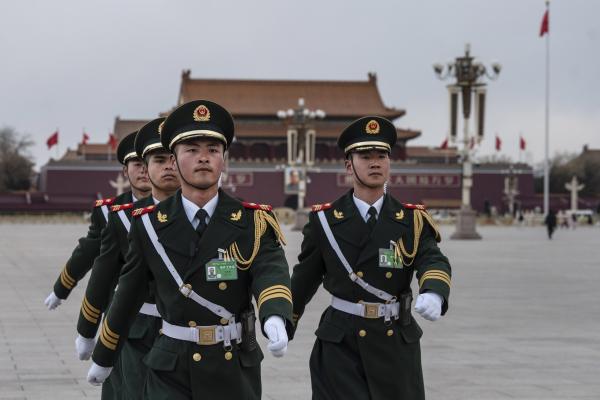 Members of the Peoples Liberation Army flag honor guard march in Tiananmen Square on March 11, 2024, in Beijing, China. (Photo by Kevin Frayer/Getty Images)