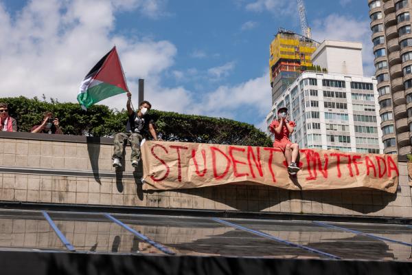 Pro-Palestinian protesters rally outside the Fordham University Lincoln Center on May 1, 2024, in New York City. (Photo by Spencer Platt/Getty Images)