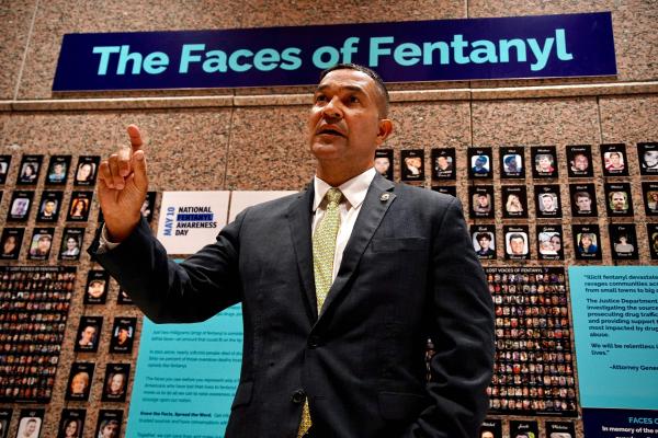 Ray Donovan, chief of operations of the Drug Enforcement Administration (DEA), stands in front of "The Faces of Fentanyl" wall in Arlington, Virginia, on July 13, 2022.  (Agnes Bun/AFP via Getty Images)