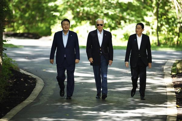 South Korean President Yoon Suk Yeol, United States President Joe Biden, and Japanese Prime Minister Kishida Fumio arrive for a joint news conference on August 18, 2023, in Camp David, Maryland. (Chip Somodevilla via Getty Images)