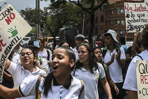 Students, teachers and social activists hold a demonstration demanding improvements in education, higher wages and better infrastructure in Medellin, Colombia, February 21, 2018 