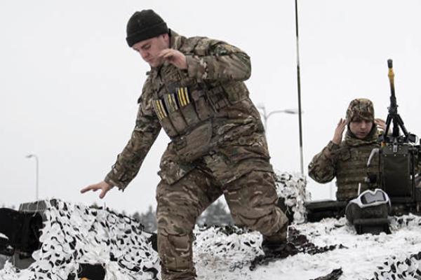 British soldiers take part in a major drill as part of NATO's "enhanced forward presence" (EFP) deployment in Poland and the Baltic nations of Estonia, Latvia, and Lithuania, at the Tapa Estonian army camp near Rakvere on February 5, 2022. (Getty Images)