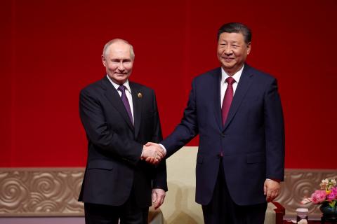 Vladimir Putin and Xi Jinping attend a concert in Beijing on May 16, 2024. (Photo by Alexander Ryumin/AFP via Getty Images)