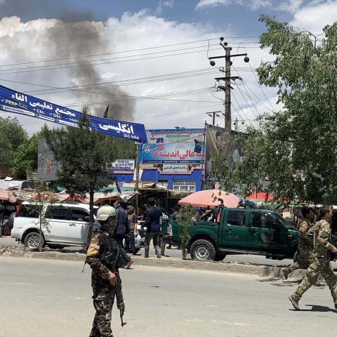 Afghan security forces inspect the scene of an attack on a clinic in Kabul, Afghanistan, on May 12, 2020. (Haroon Sabawoon via Getty Images)