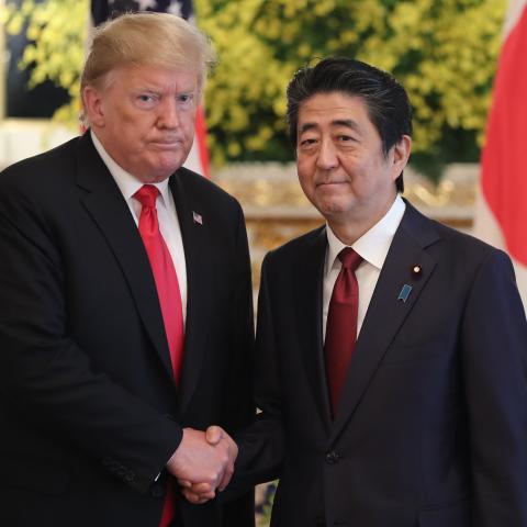 President Donald Trump and Shinzo Abe shake hands prior to their meeting on May 27, 2019, in Tokyo, Japan. (Eugene Hoshiko via Getty Images)