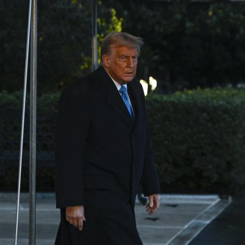 United States President Donald Trump speaks to the press before he departs from the White House on January 31, 2025. (Celal Gunes/Anadolu via Getty Images)