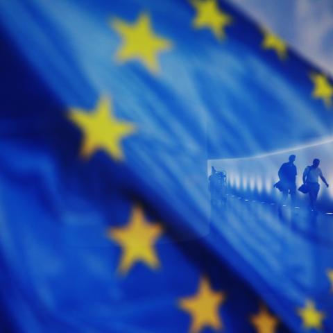 People walk by an European flag in the German Lower House of parliament ahead of the upcoming summit of the European Council and the upcoming NATO summit in Washington, DC, on June 26, 2024, in Berlin, Germany. (Michele Tantussi/Getty Images)